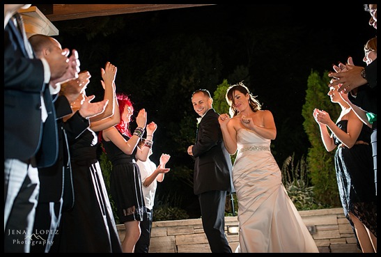 bride and groom dance down reception line